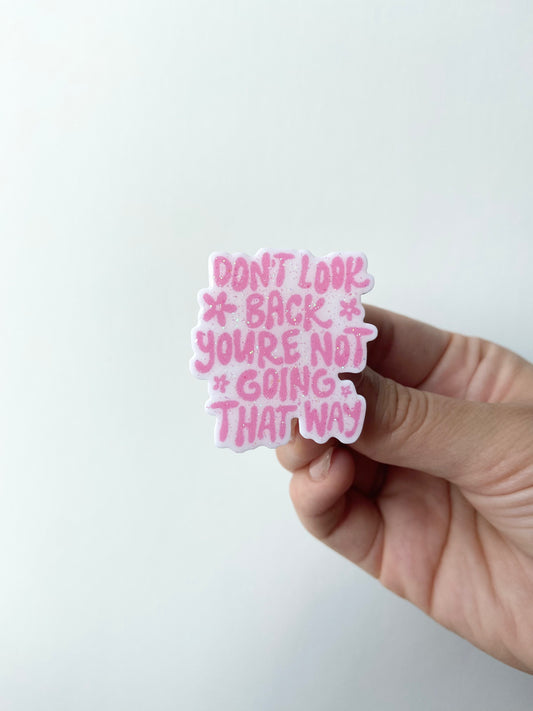 Don't Look Back Plastic Badge Topper